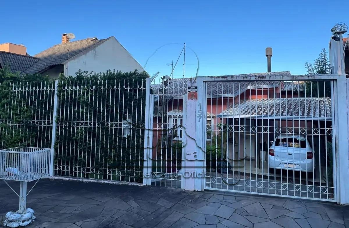 LEILÃO PRESENCIAL/ON-LINE DE UMA EXECELENTE CASA DE ALVENARIA COM TRÊS DORMITÓRIOS E PISCI em São Leopoldo/RS