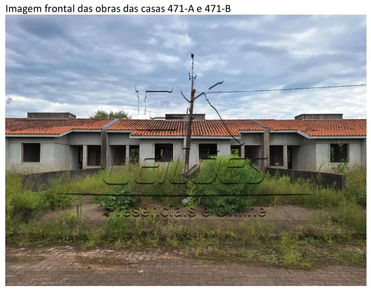 Casa de alvenaria sob nº 471-B, em construção, geminada, com a área construída de 43,48m², em Esteio/RS
