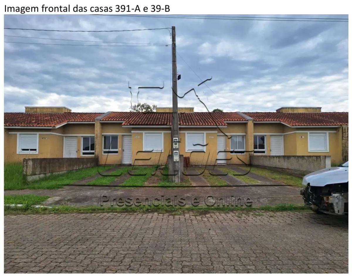 Casa de alvenaria sob nº 391-B, geminada, com a área construída de 43,48m², situada na Rua em Esteio/RS
