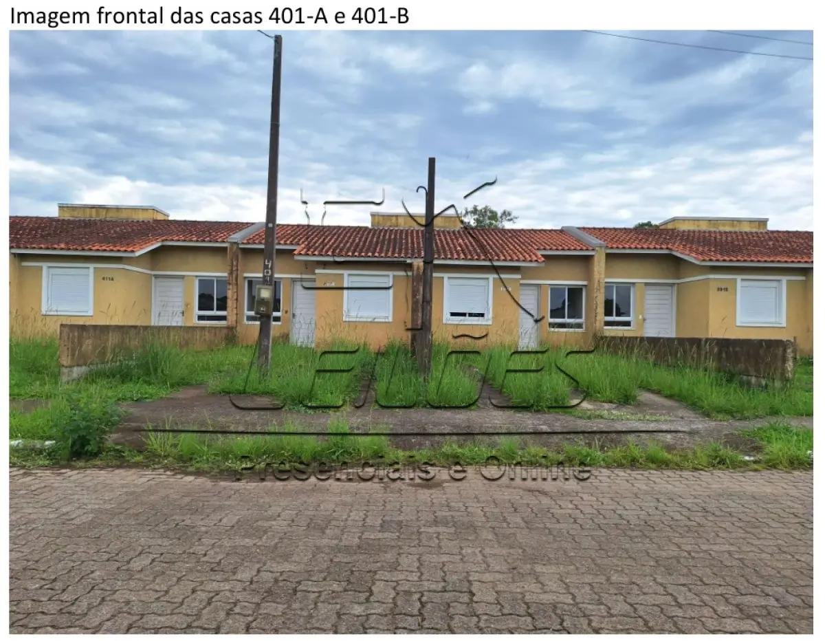 Casa de alvenaria sob nº 401-B, geminada, com a área construída de 43,48m², situada na Rua em Esteio/RS